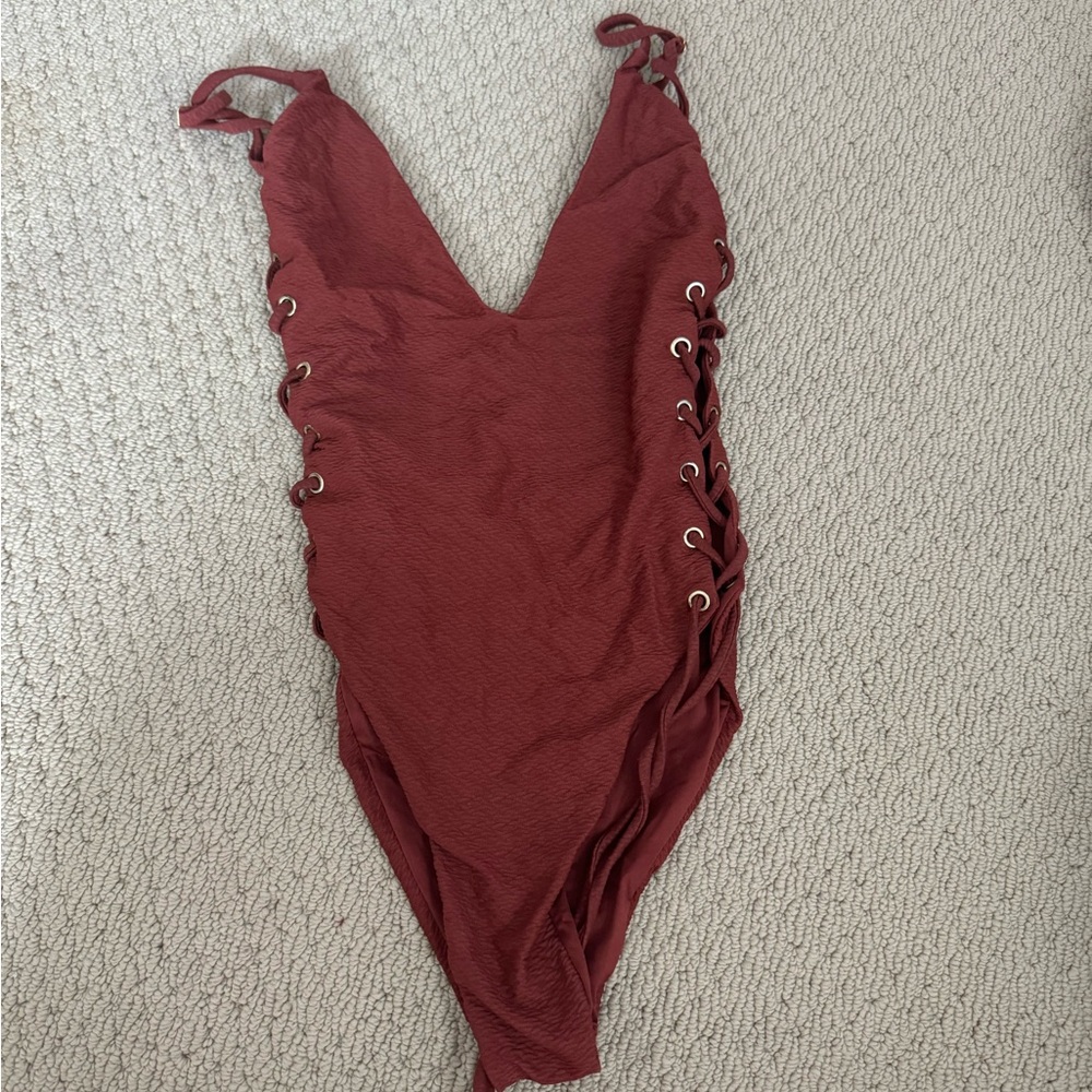 Blue Life terracotta orange one piece swim! Size small. Great condition